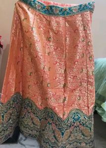 Exquisite Orange & Teal Embroidered Lehenga