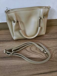 FOREVER YOUNG Beige Handbag with Pom Po