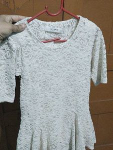 Elegant White Lace Peplum Top
