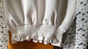 Chic White Top with Star Sleeves