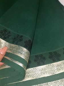 New Bottle Green Colour Plain Standard Saree