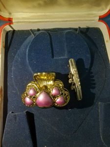 combo of 3- hand jewelry, hoops, 2 hair cli