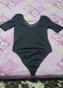 Lace Trimmed Black Bodysuit
