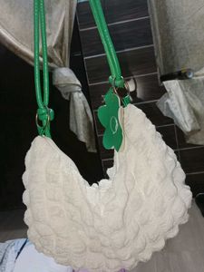 Cute Textured Hobo Bag with Flower Charm