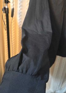Chic Black V-Neck Button-Up top