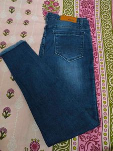 Dark Wash Denim Jeans with Frayed Hem