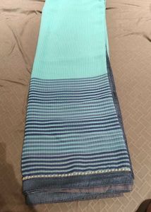 Beautiful Teal Saree with Pearl Border