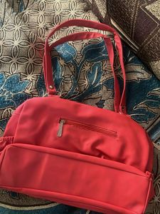 Chic Coral Handbag with Embellishments