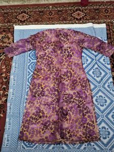 purple golden kurta with beige colour lining