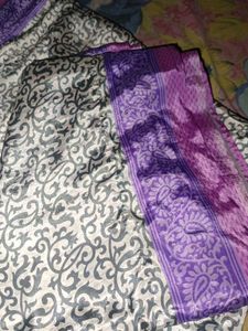 Elegant Printed Saree with Purple Border