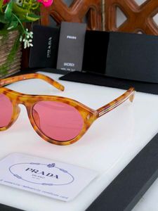 PRADA Sunglasses - Tortoiseshell Frame Pink Lens