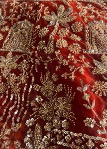 Stunning Orange Embellished Lehenga Choli