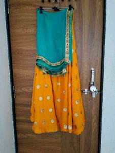 Orange Lehenga with Teal Dupatta