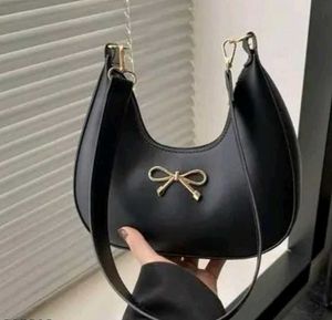 Chic Black Hobo Bag with Bow Accent