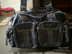 Stylish Black Hobo Bag with multiple pockets compa