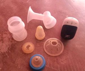 Elertric Brestpump with feeding bottle 🍼