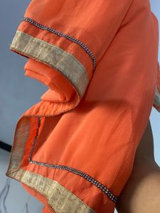 Elegant Orange Saree with Golden Border