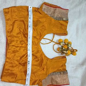 mustard yellow colour blouse with heavy latkan.