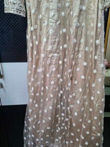 Elegant Beige Embroidered Anarkali gown