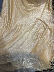 Cream Shimmer Saree with Golden n black Border