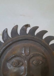 antique sun face decorative wall hanging with bell