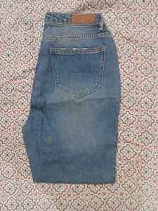Distressed Blue Denim Jeans