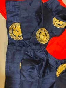 Elegant orange Saree with Gold Embellishments