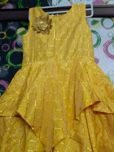 Vibrant Yellow Dress with Golden Flower