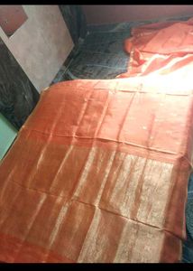 Vibrant Orange Saree with Golden Border