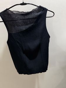 Elegant Black Sleeveless Top with Sheer Yoke Detai