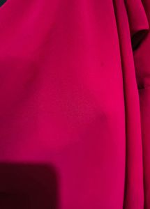 pink top with flared sleeves