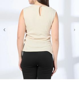 Elegant Cream Sleeveless Top with Embellishment al