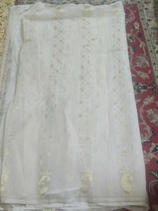 Elegant White Saree with Gold Motifs