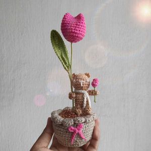 Crocheted Tulip pot with a tiny bear