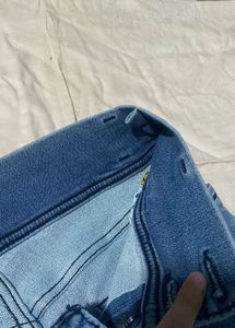 Ripped Knee Denim Jeans