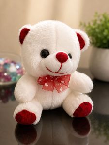 Adorable White Teddy Bear with Red Bow