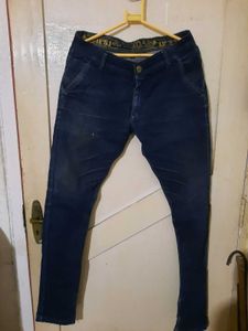 2 numbers of Distressed Blue Jeans