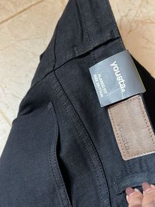 Trendy shredded bottom Black Flare Jeans