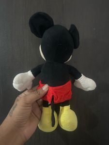 Mickey Mouse plush toy, resembling the classic