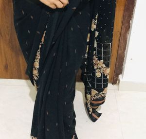 Elegant Black Saree with Floral Border