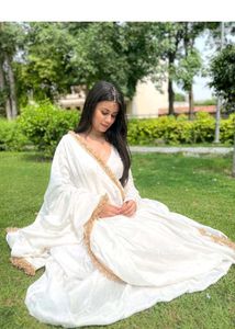 Elegant White Ethnic Gown with Gold Trim