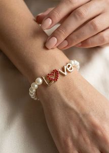 Pearl Bracelet with "Love" Charm