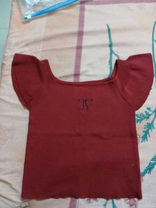 Chic Red Top with Bow Detail