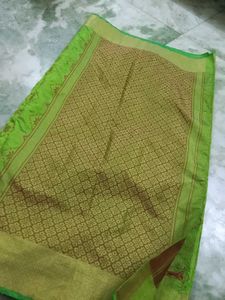 Vibrant Green Saree with Golden Border