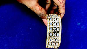 Elegant Gold Bangle with White Stones