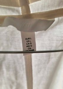 Chic White Sleeveless Wrap Top