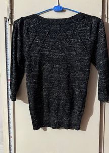 Black stylish top with shimmery interlacing