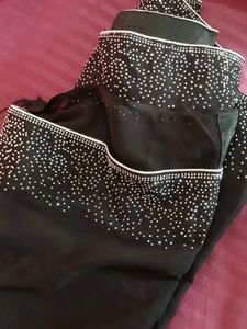 Stunning Black Saree with Crystal Embellishments