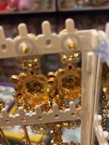 Exquisite Gold Jhumka Earrings with Pearls