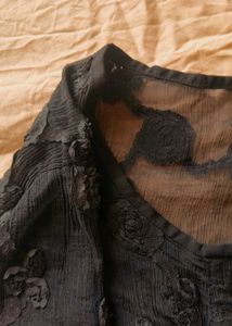 Sheer black floral self-design top